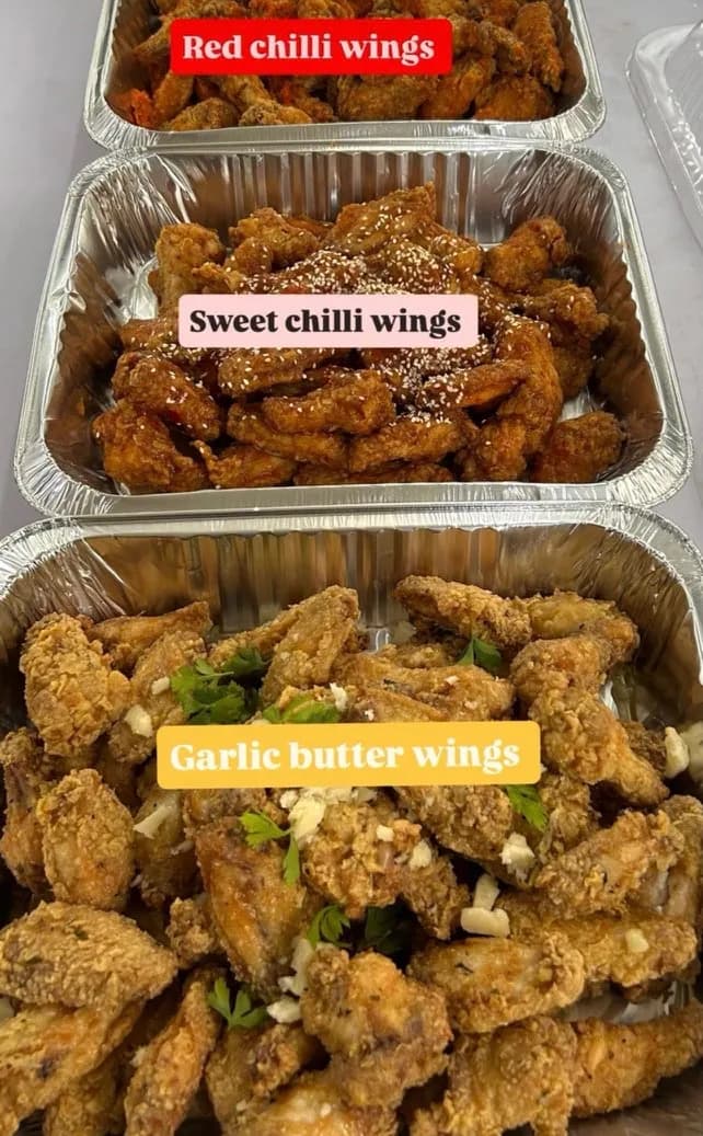 Trays of red chilli, sweet chilli and garlic butter wings